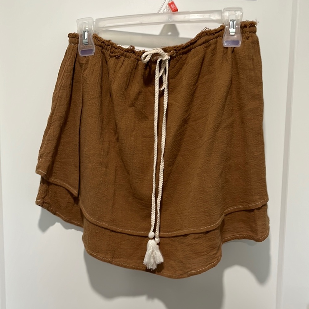 Browny/gold, dual layered skirt with drawstring waist.